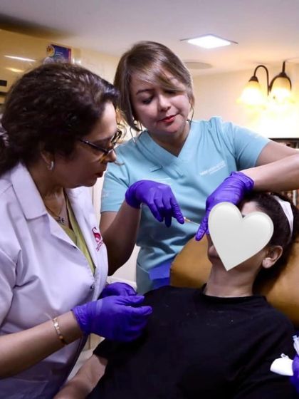 A closer view of the hands-on training, focusing on the precise art of injectable aesthetics.