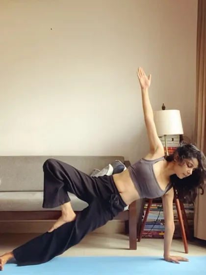 A variation of Side Plank that challenges core stability and opens the hips. This pose is great for building full-body strength.