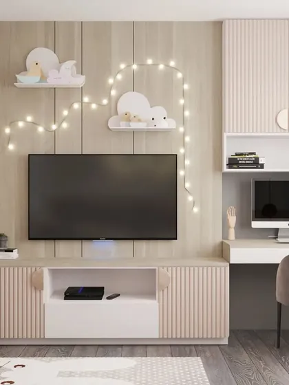 A multi-functional kid's room with a TV and entertainment unit, a compact study desk, and a small indoor gym area with a climbing wall and rings.