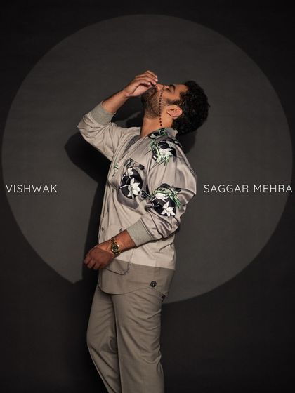 Vishwak Sen in a striking pose, wearing the Ethereal Suit. This look showcases the blend of artistic design and comfortable, wearable tailoring.