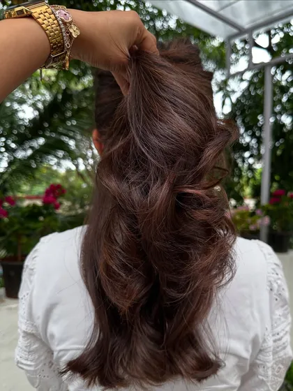 Another example of cascading layers and color. This technique works beautifully on dark hair, adding subtle dimension that catches the light.