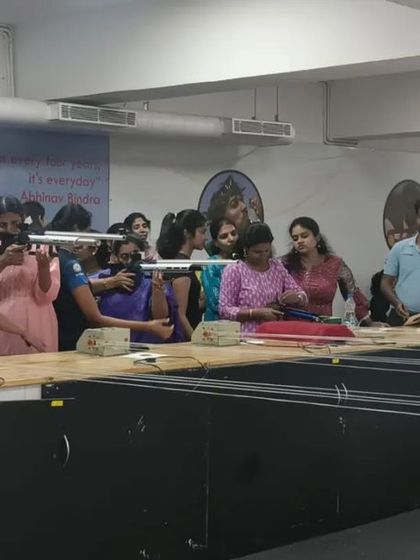 The range becomes a hub of activity as the corporate group gets hands-on with the air rifles under my team's supervision.