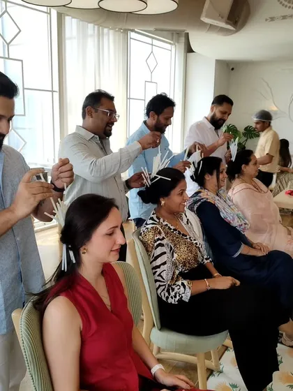 A fun and silly game where guests are decorating their partners' hair with clips. Couple games like this are perfect for anniversaries and sangeets to get everyone laughing.