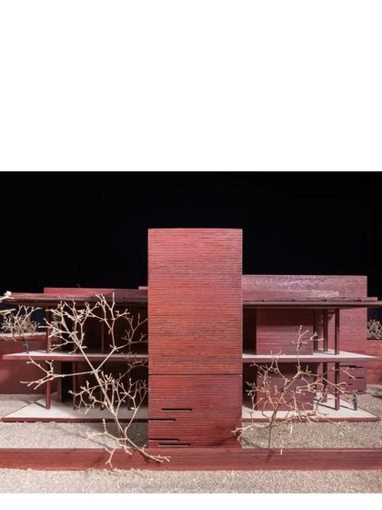 Another view of the Tiruppur house model. The use of wood and the inclusion of delicate, tree like forms helps us to visualize the project's connection to its natural surroundings.