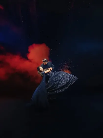 I love to play with light and color to create something truly artistic. This reception portrait uses bold, dramatic smoke and lighting to frame the couple in a moment that feels like a scene from a movie.