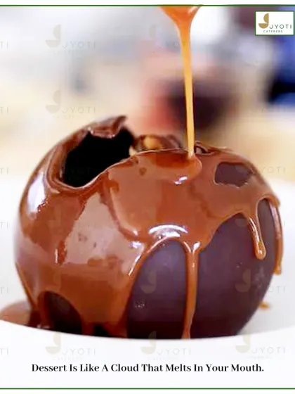 Dessert should be a moment of pure theatre. This melting chocolate sphere reveals a hidden treat as warm caramel is poured over it, offering guests a dramatic and delicious conclusion to their meal.