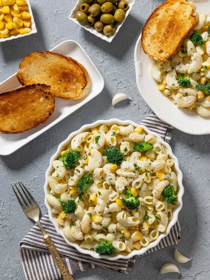 An alternate angle of the white sauce macaroni, providing a different perspective for menu or social media use.