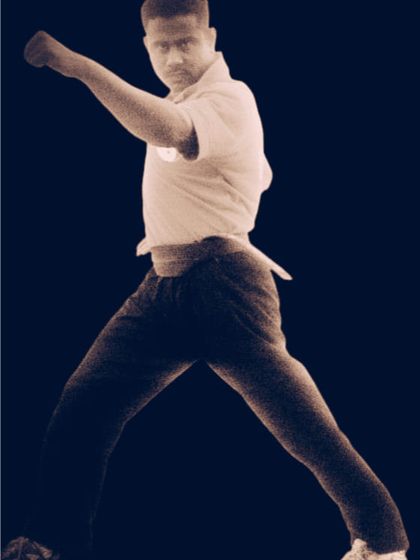 A powerful punching stance from 2007. The fundamentals of a strong stance and punch are timeless.