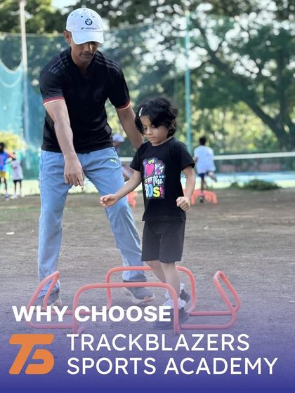 A coach guides one of our youngest athletes over mini-hurdles. This image incapsulates our commitment to cultivating athletes from a young age.