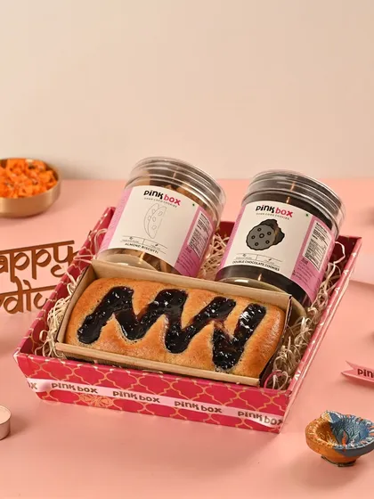 The "Rangmanch" hamper offers great variety with a Blueberry Marble Cake and two jars of our popular cookies, Almond Biscotti and Double Chocolate.