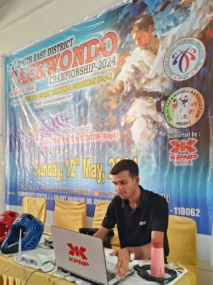 A look behind the scenes at the South East District Taekwondo Championship, where modern KPNP sensor technology is used for scoring.