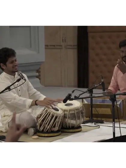 Sharing a smile with my harmonium accompanist. The lehra player is essential in a tabla solo for maintaining the melodic framework of the rhythmic cycle.