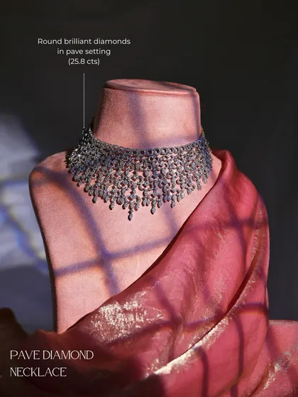 The Pave Diamond Necklace on a bust, showcasing its impressive scale and intricate design. It is crafted with 25.8 carats of round brilliant diamonds in an elegant pave setting.