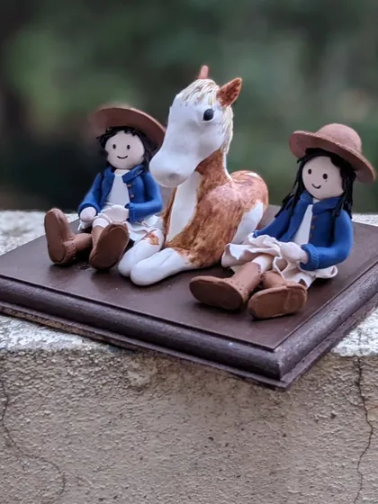 Another angle of the horse and riders birthday cake topper. Creating these narrative scenes is one of my favorite things to do, as they tell a complete story.