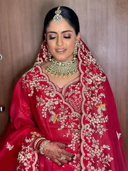 A serene moment captured. The soft, shimmery eye makeup looks beautiful whether the eyes are open or closed.
