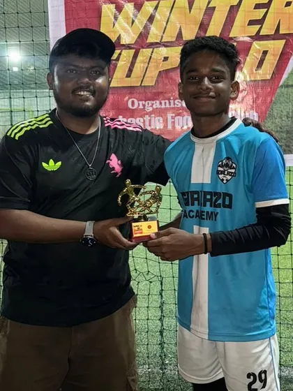 Recognizing individual excellence. One of our players receives his award for a standout performance during the Winter Cup.