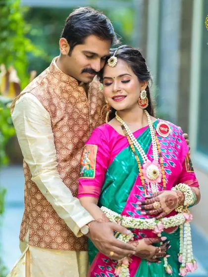 A sweet moment between the expecting couple. Her floral jewellery adds a touch of romance and celebration to their photoshoot.
