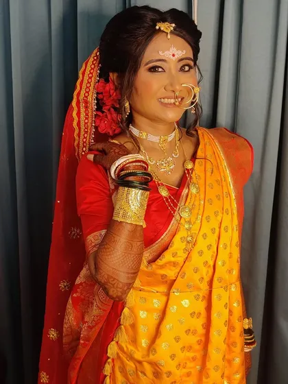 Priyanka showcasing her 'shakha pola' bangles, a symbol of a married Bengali woman.