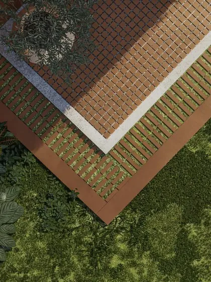 An aerial detail showing the proposed textures for the outdoor flooring, blending seamlessly with the surrounding grass and landscape.