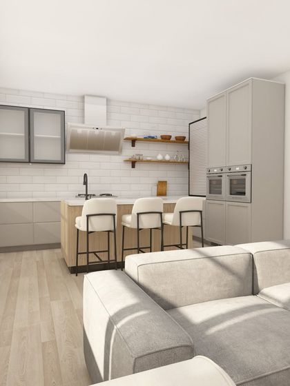 A 3D view of an open-plan living and kitchen area. The light grey kitchen cabinets and large island with a sink create a functional yet social space that connects seamlessly with the living room.