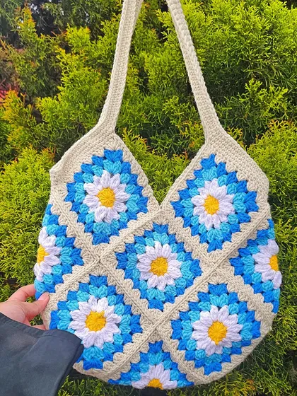 I have a soft spot for granny squares, and this Daisy Tote bag is a perfect example of how classic techniques can create something fresh and modern. I can customize the colors to create a tote that's totally you.