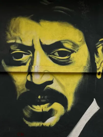 An intense, high-contrast mural of actor Irrfan Khan, showcasing the artistic talent found on Chapel Road, Bandra.