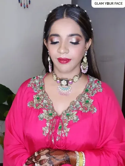 When a client puts their complete trust in you, magic happens. This full glam look features a dramatic smokey eye and a bold red lip, perfect for a bride who wants to make a statement on her big day.