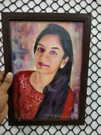 A framed oil portrait with a soft, abstract background. The focus is entirely on the subject's warm expression.