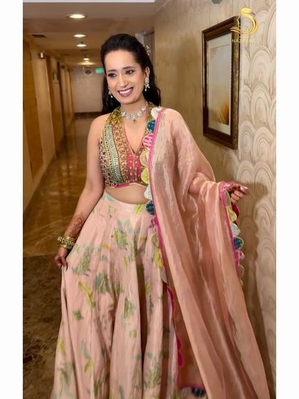 My bride looking radiant and happy with her floral half-updo.