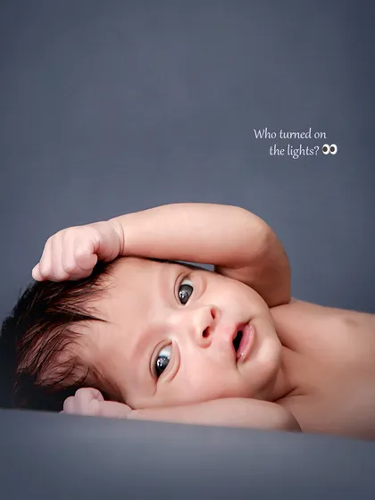 Not all babies sleep through their session, and we love it. Those wide-eyed, curious moments are full of personality, and we are always ready to capture these wonderfully unscripted expressions.