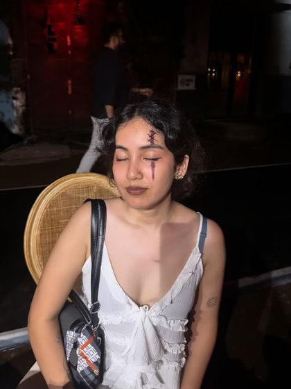 The full effect of the stitched wound makeup, showing how it sits on the face for a realistic and unsettling look.