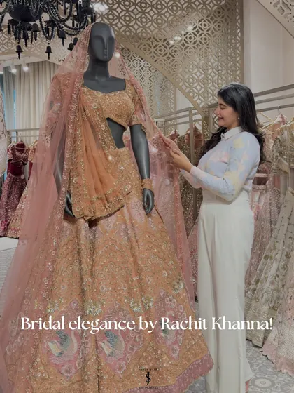Exploring the world of Rachit Khanna’s bridal couture. This peach lehenga showcases his beautiful blend of traditional Indian techniques and modern flair.