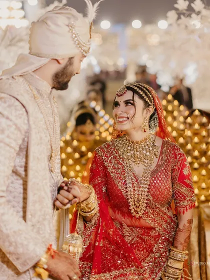 A look of pure love and adoration from the bride to her groom during their wedding ceremony.