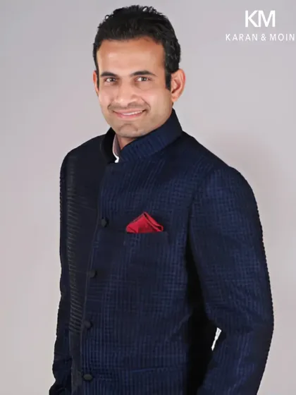 Cricketing icon Irfan Pathan showcases refined taste in a custom navy textured Bandhgala. This look is a perfect example of how I balance classic silhouettes with modern details, like a bold pocket square, to create a confident and lasting impression.