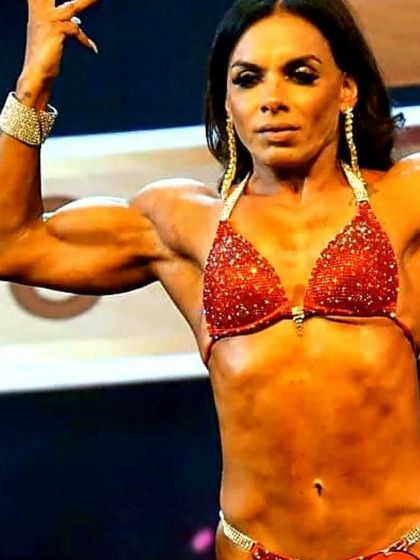 A close up shot from the stage, showing the conditioning and confidence needed to compete. This level of preparation is what my coaching provides.