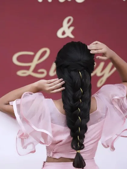Another view of the stylish gold-threaded braid, showing its clean lines and unique detail.