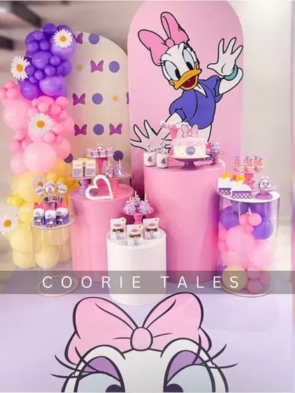 A dash of pink, a pop of purple, and a whole lot of style for a Daisy Duck birthday bash. We love creating vibrant and fashionable parties with custom character backdrops and coordinated dessert tables.