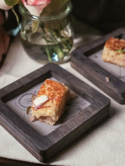 A classic French favorite with my own twist. These Mini Croque Monsieur bites are made with chicken ham, onion jam, fresh jalapeno, and emmental cheese.