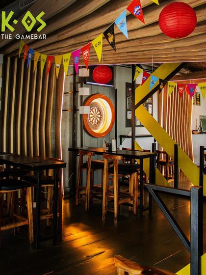 Lights, vibes, and unforgettable nights. Our decor, with its warm lighting and festive banners, sets the perfect mood.