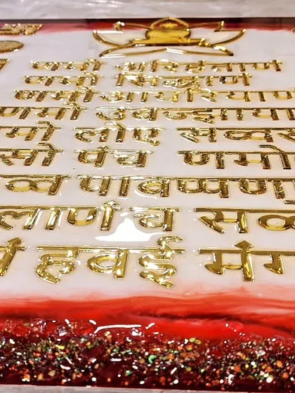A Navkar Mantra frame in the making with my student at our workshop.