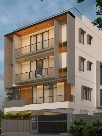 Another view of the 3-storey modern residence, highlighting the building's corner and the way the different materials wrap around the form.