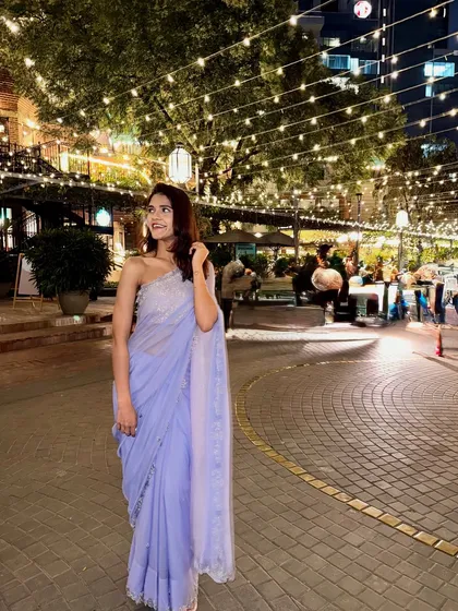 A saree can be one of the most elegant and modern garments in your wardrobe. Here, I'm wearing a beautiful lavender saree for an evening out. The simple drape and minimal accessories let the color and fabric shine, proving that traditional wear can be effortlessly chic for any occasion.