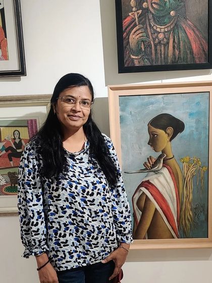 Posing next to a beautiful painting by another artist at the BIC exhibition.