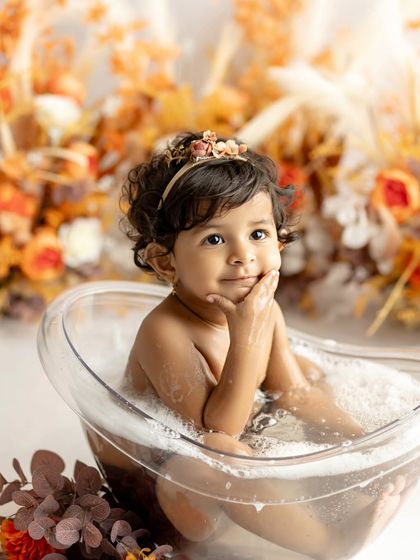 A thoughtful pose from this little model in her autumn-themed tub bath.