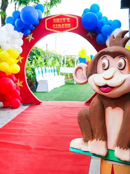 Another angle of the fun circus entrance, showing the path leading into the main party area.