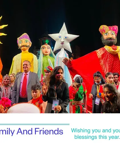 Here you can see some of our giant parade puppets on stage with our full troupe. We create these large-than-life characters, like the sun puppet and the Rajasthani man, from lightweight foam so they are easy to carry during festivals and events.