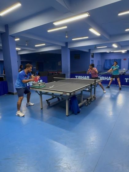 Friday practice mode is on. Here, players are engaged in a doubles drill, focusing on coordination and rapid exchanges at the net.