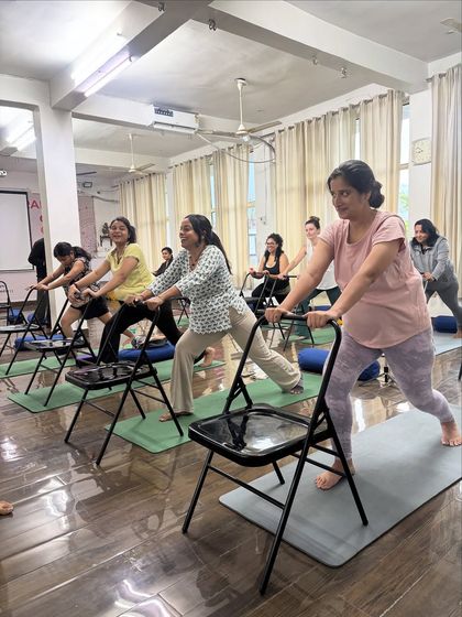 A glimpse into one of my chair yoga workshops. Using chairs makes yoga accessible and provides support, allowing everyone to experience the benefits of the poses safely.