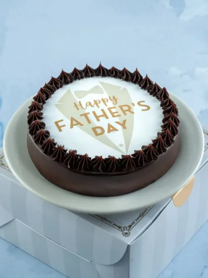 A classic Belgian Chocolate cake with a special 'Happy Father's Day' design. It's a simple, elegant, and delicious way to celebrate your dad.