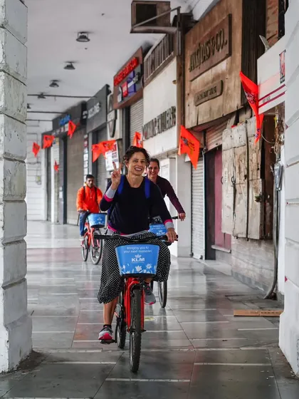 More happy faces in Connaught Place. The joy of exploring the city on two wheels is infectious, and we love capturing these moments.